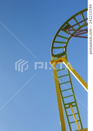 Close-up of a thrill ride at the fairground Close-up of a thrill ride at the fairground 142211544