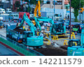 Miniature-style crane at a city construction site [Construction image] 142211579