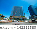 A crane at a construction site in an urban area [Construction image] 142211585