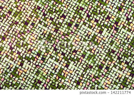 Plaid fabric with various shades of green and pink 142211774