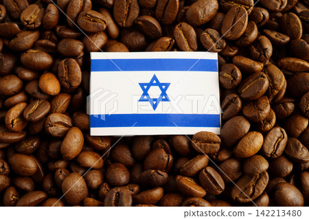 Israel flag on coffee beans, shopping online for export or import food product. Israel flag on coffee beans, shopping online for export or import food product. 142213480