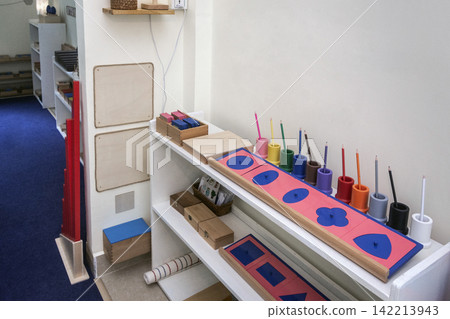 Montessori educational learning materials and equipment for young children in school interior Montessori educational learning materials and equipment for young children in school interior 142213943