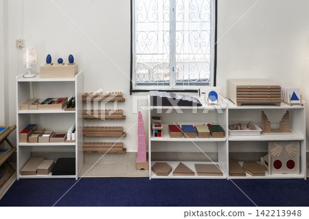 Montessori educational learning materials and equipment for young children in school interior Montessori educational learning materials and equipment for young children in school interior 142213948