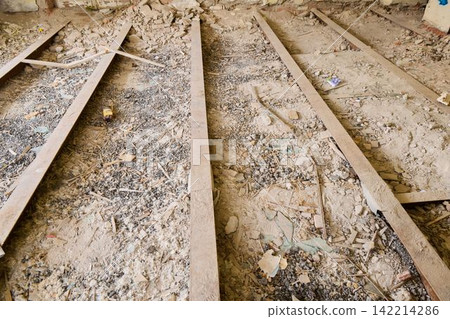 Urban decay captured through aged wood and debris fragments 142214286