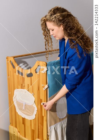 Assembling wooden storage unit for nursery essentials today Assembling wooden storage unit for nursery essentials today 142214333