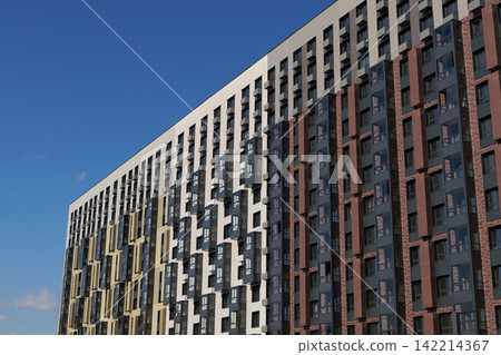 Dynamic vertical facade with diverse materials and stripes Dynamic vertical facade with diverse materials and stripes 142214367