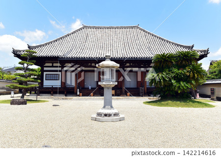Hokkeji Temple under a blue sky and lush greenery Hokkeji Temple under a blue sky and lush greenery 142214616