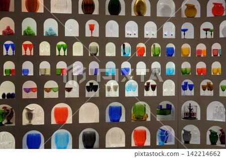 Imaginative display of bright colourful glasswork in a craft and design shop in Florence, Tuscany, Italy Imaginative display of bright colourful glasswork in a craft and design shop in Florence, Tuscany, Italy 142214662
