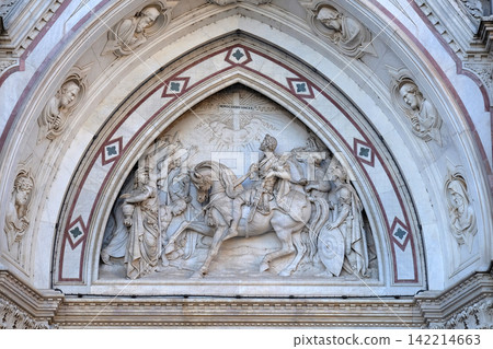 Sculpted lunette containing a scene depicting the Vision of Constantine, by Emilio Zocchi, over the right door of Basilica of Santa Croce (Basilica of the Holy Cross) - famous Franciscan church in Sculpted lunette containing a scene depicting the Vision of Constantine, by Emilio Zocchi, over the right door of Basilica of Santa Croce (Basilica of the Holy Cross) - famous Franciscan church in 142214663