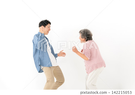 Two people dancing Zumba Two people dancing Zumba 142215053