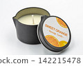 Sweet orange massage candle product closeup on white. 142215478