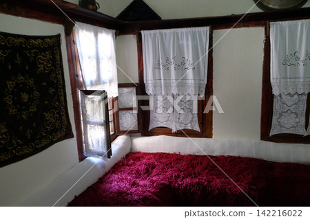 Ethnological museum, artifacts, rug and copper, in Berat, Albania Ethnological museum, artifacts, rug and copper, in Berat, Albania 142216022