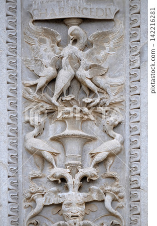 Relief on the portal of the Cathedral of Saint Lawrence in Lugano, Switzerland Relief on the portal of the Cathedral of Saint Lawrence in Lugano, Switzerland 142216281