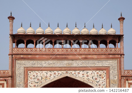 Gate to the Taj Mahal (Crown of Palaces), an ivory-white marble mausoleum in Agra, Uttar Pradesh, India Gate to the Taj Mahal (Crown of Palaces), an ivory-white marble mausoleum in Agra, Uttar Pradesh, India 142216487