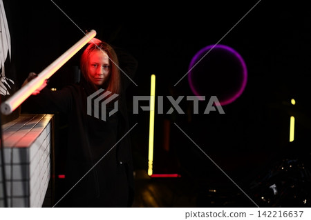 Elegant female character basking in vibrant club ambiance Elegant female character basking in vibrant club ambiance 142216637
