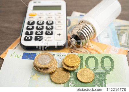 Light bulb and euro money for electric price. Light bulb and euro money for electric price. 142216778