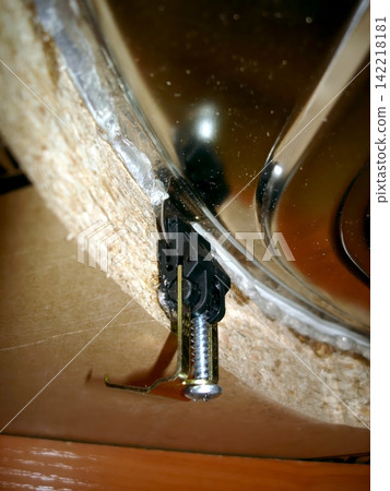 Mounting Bracket Securing a Stylish Kitchen Sink to a Countertop With Precision Mounting Bracket Securing a Stylish Kitchen Sink to a Countertop With Precision 142218181