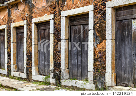 Doors with stone frames in a historic building Doors with stone frames in a historic building 142219124