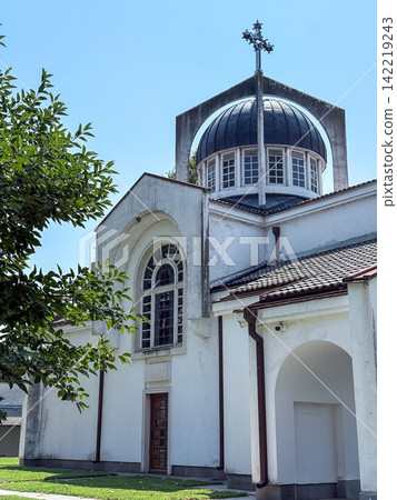 White Historic Church With Blue Dome And Cross White Historic Church With Blue Dome And Cross 142219243