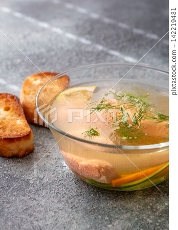Healthy Nordic Clear Salmon Soup With Fresh Dill Lemon And Vegetables In Glass Bowl Healthy Nordic Clear Salmon Soup With Fresh Dill Lemon And Vegetables In Glass Bowl 142219481