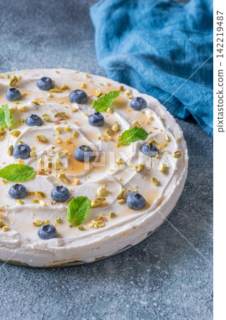 Rustic No Bake Mascarpone Cheesecake Topped With Blueberries Pistachios Maple Syrup And Mint Rustic No Bake Mascarpone Cheesecake Topped With Blueberries Pistachios Maple Syrup And Mint 142219487