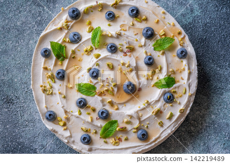 Rustic No Bake Mascarpone Cheesecake Topped With Blueberries Pistachios Maple Syrup And Mint Rustic No Bake Mascarpone Cheesecake Topped With Blueberries Pistachios Maple Syrup And Mint 142219489