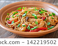 Asian stir fry udon noodles with prawns mushrooms vegetables in rustic ceramic bowl 142219502