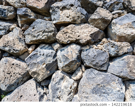 background from black tuff stones of ancient wall background from black tuff stones of ancient wall 142219618