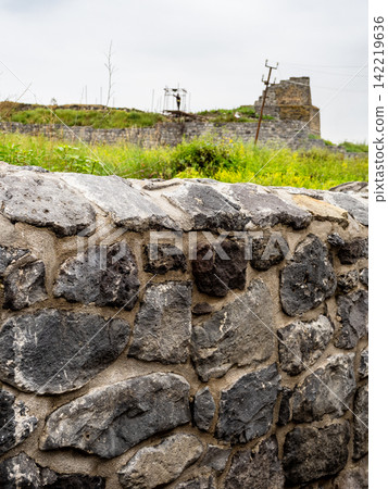 tuff wall of Large Bathhouse building in Lori Berd tuff wall of Large Bathhouse building in Lori Berd 142219636