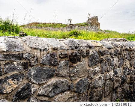 black tuff wall of Large Bathhouse in Lori Berd black tuff wall of Large Bathhouse in Lori Berd 142219912