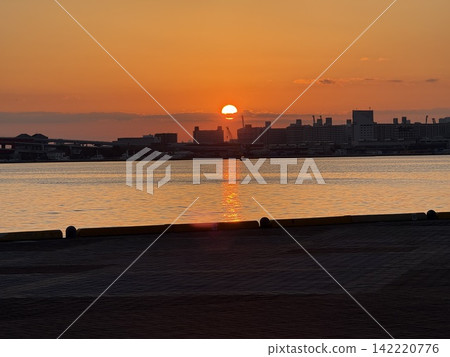 The silhouette of Kobe Port and Port Island just after sunrise. The silhouette of Kobe Port and Port Island just after sunrise. 142220776