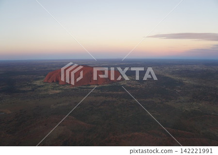 Sunset over Uluru as seen from a helicopter, Australia Sunset over Uluru as seen from a helicopter, Australia 142221991