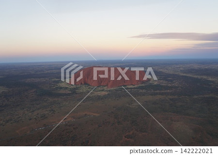 Sunset over Uluru as seen from a helicopter, Australia Sunset over Uluru as seen from a helicopter, Australia 142222021