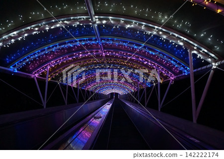 A fantastical tunnel of lights, shining with a kaleidoscope of colors. A fantastical tunnel of lights, shining with a kaleidoscope of colors. 142222174