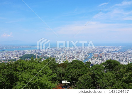 A panoramic view of Tokushima city and the Seto Inland Sea from the summit of Mount Bizan, the symbol of Tokushima City. A panoramic view of Tokushima city and the Seto Inland Sea from the summit of Mount Bizan, the symbol of Tokushima City. 142224437