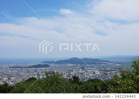 A panoramic view of Tokushima city and the Seto Inland Sea from the summit of Mount Bizan, the symbol of Tokushima City. A panoramic view of Tokushima city and the Seto Inland Sea from the summit of Mount Bizan, the symbol of Tokushima City. 142224443