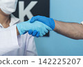 Two caucasian scientist men woman fist bump team partner shake hands together. Teamwork two scientist science chemistry research in laboratory. Close up hands pharmaceutical science team partnership 142225207