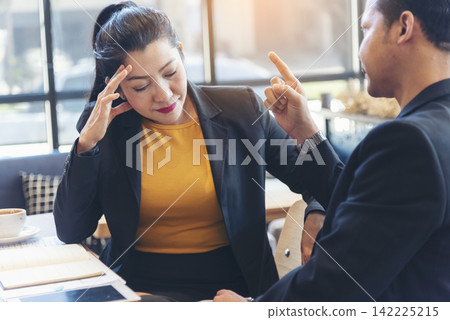 Two businesspeople meeting work at office desk. Teamwork partners team with Business strategy chart graph, infographic data financial report. Team partner planning marketing finance excel stat report Two businesspeople meeting work at office desk. Teamwork partners team with Business strategy chart graph, infographic data financial report. Team partner planning marketing finance excel stat report 142225215