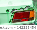 Rust and scratches on a car Rusty iron plate of an old car 142225454