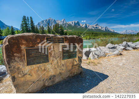 The monument commemorating the sister city relationship between Higashikawa Town and Canmore, Alberta, Canada, along the Bow River, and Mount Rundle. The monument commemorating the sister city relationship between Higashikawa Town and Canmore, Alberta, Canada, along the Bow River, and Mount Rundle. 142227035