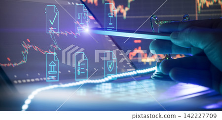 Financial compliance and digital law concept. Businessman using stylus pen on laptop with virtual legal, security, and regulatory document icons over stock market charts. Financial compliance and digital law concept. Businessman using stylus pen on laptop with virtual legal, security, and regulatory document icons over stock market charts. 142227709