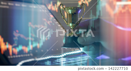 Financial success and achievement concept. Trader hand holding a golden trophy with double exposure of stock market candlestick charts. 142227710