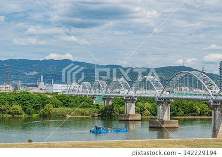 A water pipe bridge over the Yodo River, Hirakata City, Osaka Prefecture A water pipe bridge over the Yodo River, Hirakata City, Osaka Prefecture 142229194