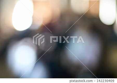Blurred Audience With Large Light Reflections And Soft Bokeh In Indoor Meeting Environment Showing 142230409