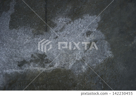 Irregular Light Stain Spreading Across Dark Concrete Floor Surface With Textured Residue And Damp Irregular Light Stain Spreading Across Dark Concrete Floor Surface With Textured Residue And Damp 142230455