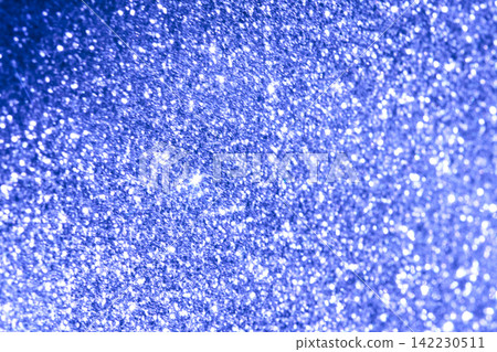 Blue Glitter Particles Shimmering And Reflecting Light In Macro Closeup On Textured Surface 142230511