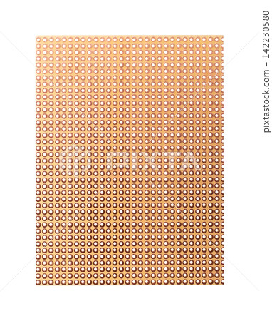 Universal perfboard, dot matrix prototyping board for building electronic circuits, made of phenolic paper with single sided copper coating and solder pads around the holes. Isolated from above. Photo Universal perfboard, dot matrix prototyping board for building electronic circuits, made of phenolic paper with single sided copper coating and solder pads around the holes. Isolated from above. Photo 142230580