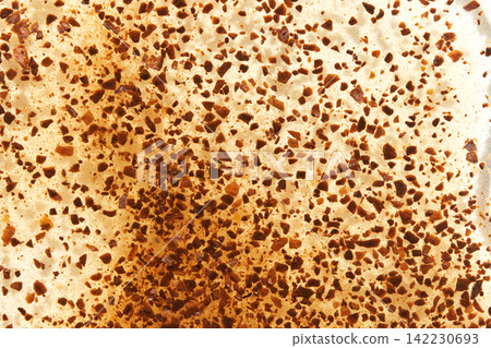 Closeup Toast Surface Covered Crushed Coffee Granules Macro Texture Pattern On White Background 142230693