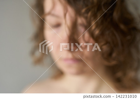 Blurred Woman Portrait Unfocused Neutral Background Shallow Depth Of Field Soft Expression Indoor Blurred Woman Portrait Unfocused Neutral Background Shallow Depth Of Field Soft Expression Indoor 142231010
