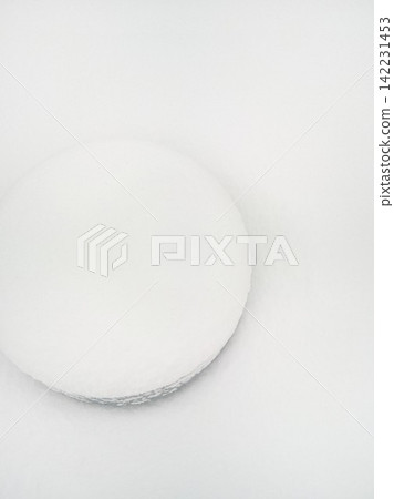 Round Concrete Bollard Half Visible Under Fresh Snow On Flat White Surface Angled Top-Down Round Concrete Bollard Half Visible Under Fresh Snow On Flat White Surface Angled Top-Down 142231453